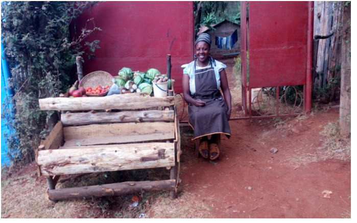 Eliza Muriuki selling vegetables